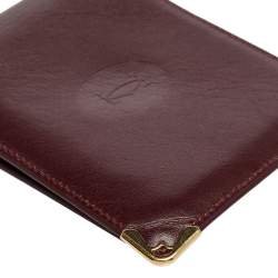 مملوكة مسبقًا Cartier Burgundy Leather Must De Cartier 6CC Bifold Wallet