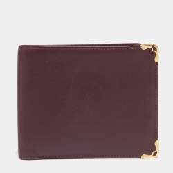 Pre Owned محفظة كارتييه موست دو كارتييه 6 سي سي جلد أحمر داكن ثنائية الطية