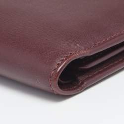 Pre Owned محفظة كارتييه موست دو كارتييه 6 سي سي جلد أحمر داكن ثنائية الطية