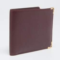 Pre Owned محفظة كارتييه موست دو كارتييه 6 سي سي جلد أحمر داكن ثنائية الطية