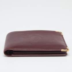 Pre Owned محفظة كارتييه موست دو كارتييه 6 سي سي جلد أحمر داكن ثنائية الطية