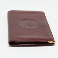 مملوكة مسبقًا Cartier Burgundy Leather Must de Cartier Checkbook Wallet