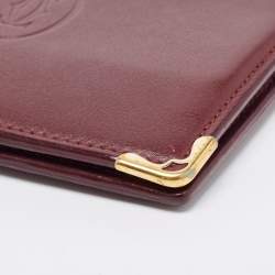 Pre Owned Cartier Burgundy Leather Must De Cartier 6CC Bifold Wallet