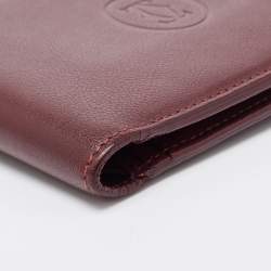 Pre Owned Cartier Burgundy Leather Must De Cartier 6CC Bifold Wallet