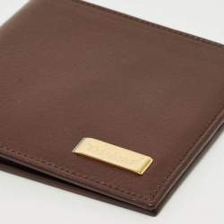 مملوكة مسبقًا محفظة شوپارد بطيّتين جلد بني مع طقم قلم حبر جاف