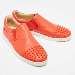 مملوكة مسبقًا Christian Louboutin Orange Leather Spikes Cap Toe Slip On Sneakers Size 42