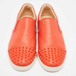 مملوكة مسبقًا Christian Louboutin Orange Leather Spikes Cap Toe Slip On Sneakers Size 42