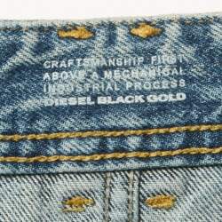مملوكة مسبقًا بنطلون ديزل بلاك جولد أزرق مرهق بطباعة الجرافيتي بقصة ضيقة الدنيم مقاس متوسط كبير خصر 33 بوصة