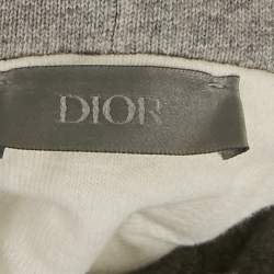 Pre Owned هودي ديور هوم رمادي مطبوع عليه شعار بمظهر متضرر مقاس صغير جدًا جدًا