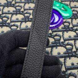 مملوكة مسبقًا حقيبة كلاتش ديور بالتعاون مع كيني شارف قماش جاكار بنقشة مائلة باللونين الأسود/البيج