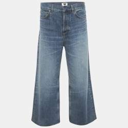 مملوكة مسبقًا بنطلون جينز كريستيان ديور دنيم أزرق واسع بوسط 33 إنش