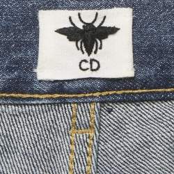 مملوكة مسبقًا بنطلون جينز كريستيان ديور دنيم أزرق واسع بوسط 33 إنش