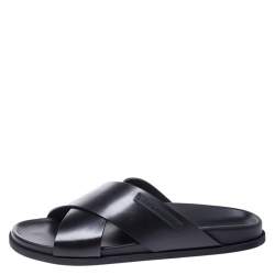 مملوكة مسبقًا صندل فلات دولتشي أند غابانا بحزام متقاطع جلد أسود مقاس 39