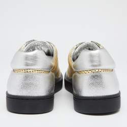 Pre Owned حذاء رياضي دولتشي آند غابانا جلد مثقب ذهبي / فضي بعنق منخفض مقاس 42