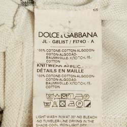 مملوكة مسبقًا تي شيرت بولو دولتشي أند غابانا بيكيه قطن كريمي بحروف دي جي مقاس إكس إكس لارج