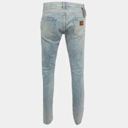 مملوكة مسبقًا بنطلون جينز دولتشي أند غابانا أزرق بقصة ضيقة مقاس الخصر 33 بوصة