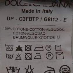 Pre Owned بنطلون جينز دولتشي أند غابانا مزين لوحة معدنية نمط ممزق دنيم مغسول أزرق فاتح مقاس وسط (ميديوم)