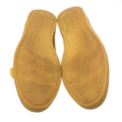 Pre Owned حذاء رياضي دولتشي آند غابانا برقبة منخفضة برباط جلد أصفر مستردة مقاس 43