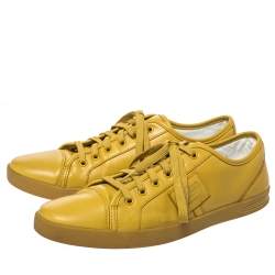 Pre Owned حذاء رياضي دولتشي آند غابانا برقبة منخفضة برباط جلد أصفر مستردة مقاس 43