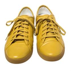 Pre Owned حذاء رياضي دولتشي آند غابانا برقبة منخفضة برباط جلد أصفر مستردة مقاس 43