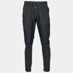 مملوكة مسبقًا Givenchy Black Logo Striped Nylon Trousers M
