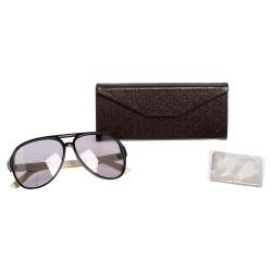 Pre Owned نظارة شمسية غوتشي أفياتور GG1065S مطاط وأسيتات أبيض / أسود متدرج