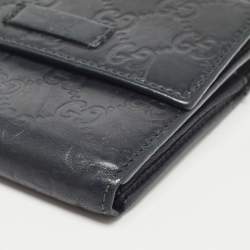 Pre Owned Gucci Black Microguccissima Leather Logo Trifold Wallet