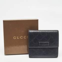 Pre Owned Gucci Black Microguccissima Leather Logo Trifold Wallet