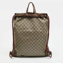 Pre Owned Gucci Courrier Beige/Brown GG Supreme Canvas Drawstring Backpack