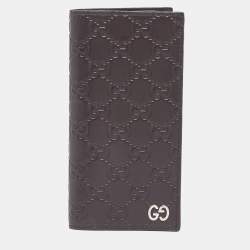 مملوكة مسبقًا محفظة غوتشي جلد غوتشيسما بني داكن ثنائية الطي بشعار G مزدوج
