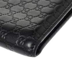 مملوكة مسبقًا Gucci Black/Mustard GG Microguccissima Leather Bifold Wallet