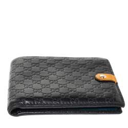 مملوكة مسبقًا Gucci Black/Mustard GG Microguccissima Leather Bifold Wallet