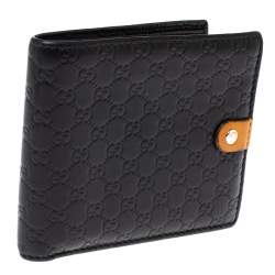 مملوكة مسبقًا Gucci Black/Mustard GG Microguccissima Leather Bifold Wallet