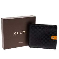 مملوكة مسبقًا Gucci Black/Mustard GG Microguccissima Leather Bifold Wallet
