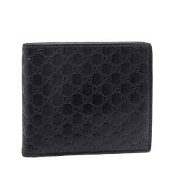 مملوكة مسبقًا Gucci Black Microguccissima Leather Money Clip Bifold Wallet
