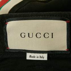 مملوكة مسبقًا بنطلون جينز غوتشي سكيني قطن باللون الأسود مع تفاصيل الحزام مقاس كبير جدا - خصر 34 بوصة