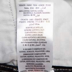 مملوكة مسبقًا بنطلون جينز غوتشي ضيق مزين بحليات موردة ونمر دنيم رمادي مقاس متوسط