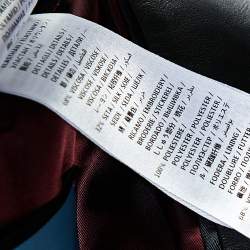 Pre Owned جاكت منفوخ غوتشي أبليك حروف دي أي واي جلد أسود مقاس متوسط