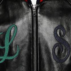 Pre Owned جاكت منفوخ غوتشي أبليك حروف دي أي واي جلد أسود مقاس متوسط