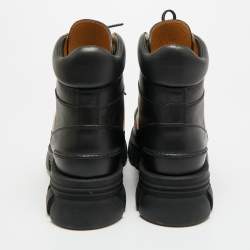 Pre Owned حذاء بوت كاحل غوتشي مزين "جي" متداخل جلد أسود مقاس 42