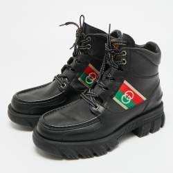 Pre Owned حذاء بوت كاحل غوتشي مزين "جي" متداخل جلد أسود مقاس 42
