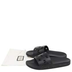 Pre Owned Gucci Black GG Cutout Rubber Pursuit Flat Slides Size 42