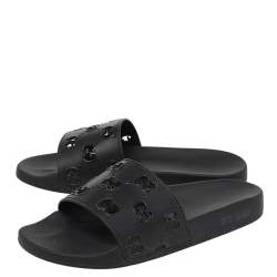 Pre Owned Gucci Black GG Cutout Rubber Pursuit Flat Slides Size 42