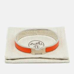 Pre Owned Hermes Clic HH Orange Enamel Palladium Plated Bracelet