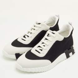 مملوكة مسبقًا حذاء رياضي هيرميس باونسينغ شبكي وزخرفي أسود/أبيض مائل مقاس 42