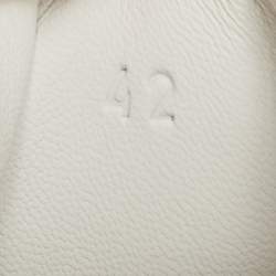 مملوكة مسبقًا حذاء رياضي هيرميس باونسينغ شبكي وزخرفي أسود/أبيض مائل مقاس 42