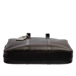 Pre Owned حقيبة لوي فيتون بورت دوكومنتز فواياج جلد تاغيا أسود PM