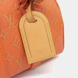 Pre Owned Louis Vuitton Orange Canvas BandouliÃ¨re Keepall 25