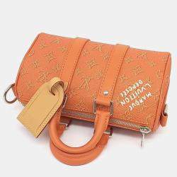 Pre Owned Louis Vuitton Orange Canvas BandouliÃ¨re Keepall 25