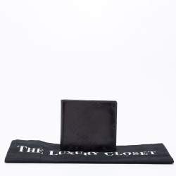 Pre Owned Louis Vuitton Dark Brown Leather Monogram Embossed Bifold Wallet 